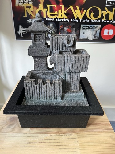 Zen style water fountain with - fountain.,