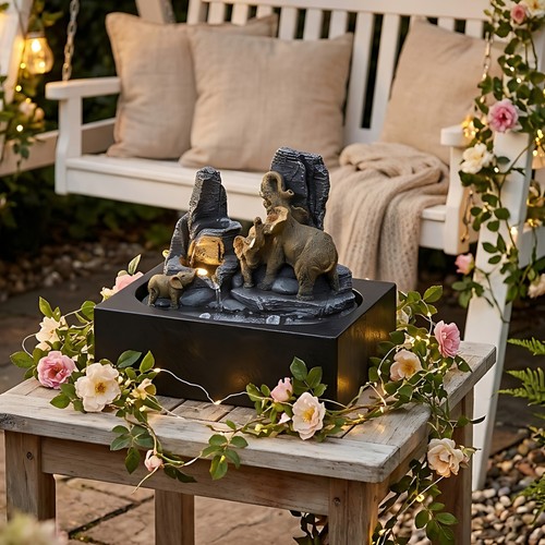 Playful elephant sculpture - playful,